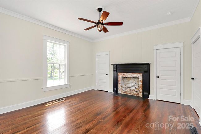 Original tongue and groove wood ceilings were preserved to maintain the homes historic charm | Image 25