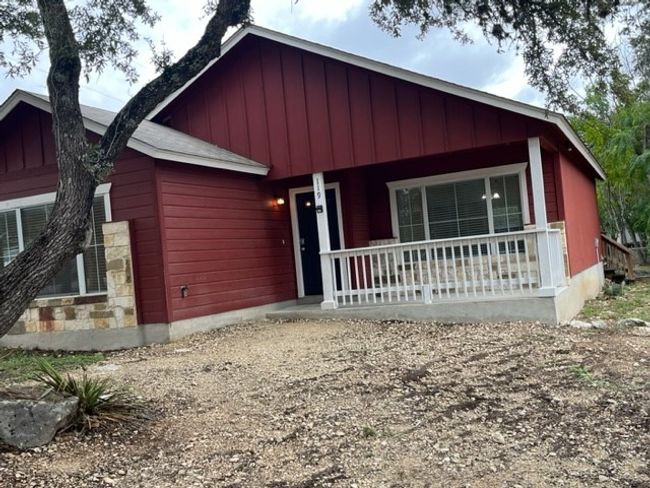 View of front of property featuring covered porch to enjoy all year! | Image 10
