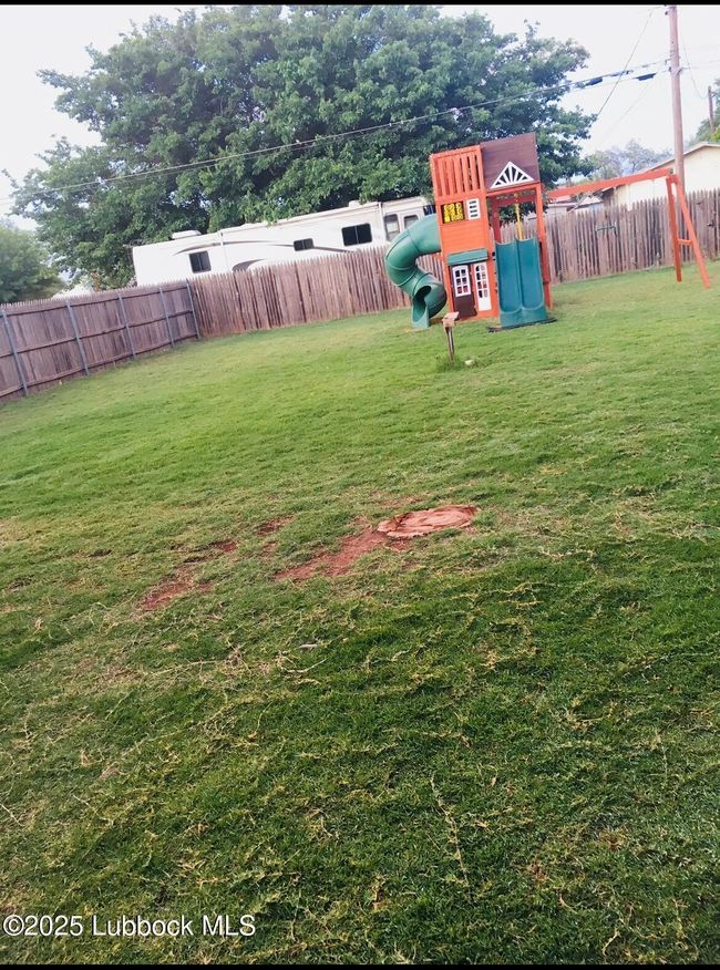 Backyard. Playset will remain. | Image 18