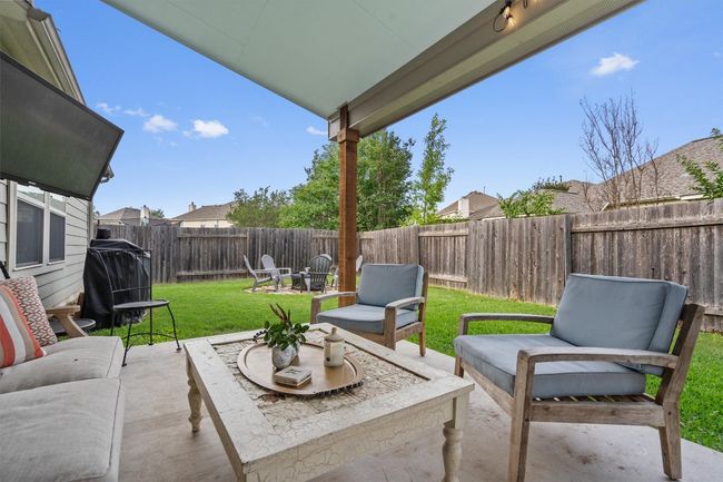 View of patio / terrace featuring an outdoor hangout area and a grill | Image 33