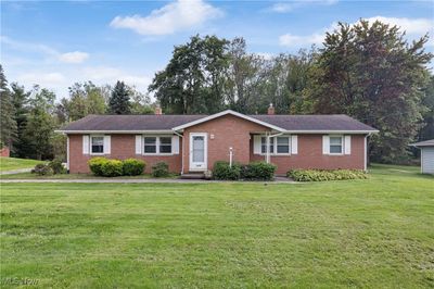 2654 & 2658 Sweitzer Road, Home with 4 bedrooms, 2 bathrooms and null parking in Uniontown OH | Image 1