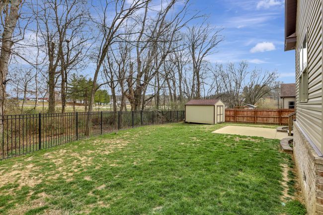 Enjoy the fenced back yard | Image 24