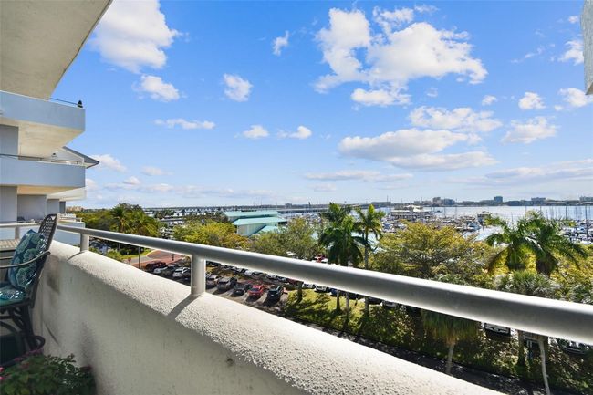View of the marina and Manatee River from the Master bedroom balcony. | Image 34