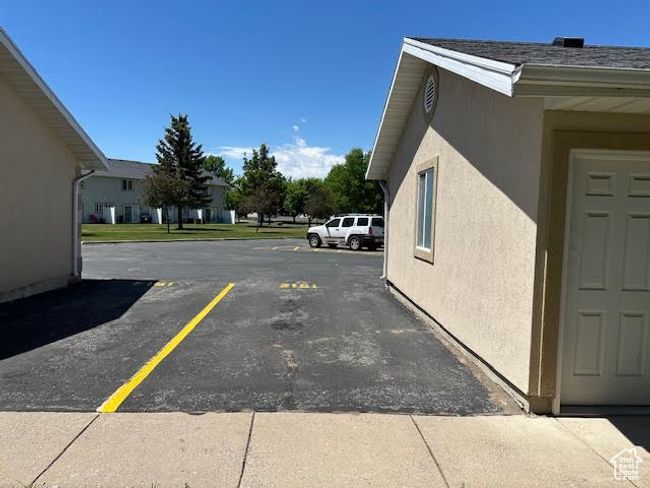 Property hosts plenty of parking and this personalized spot | Image 5
