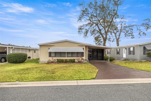 708 Coachman Dr, Leesburg, FL, 34748-6244 | Card Image