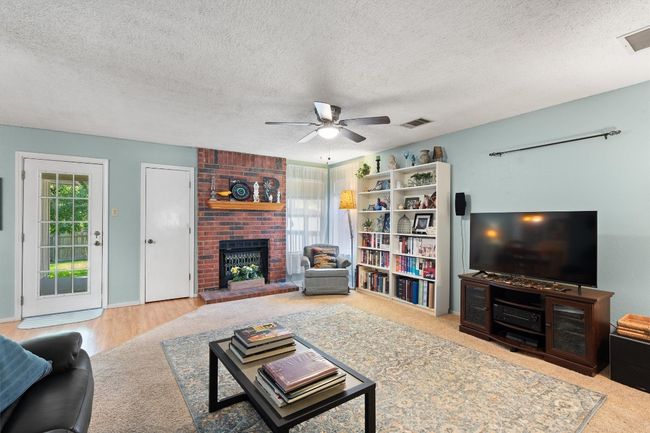 It also features direct access to the large covered back porch and beautiful shaded yard. | Image 8