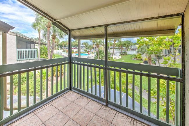 Upstairs screened-in balcony | Image 14