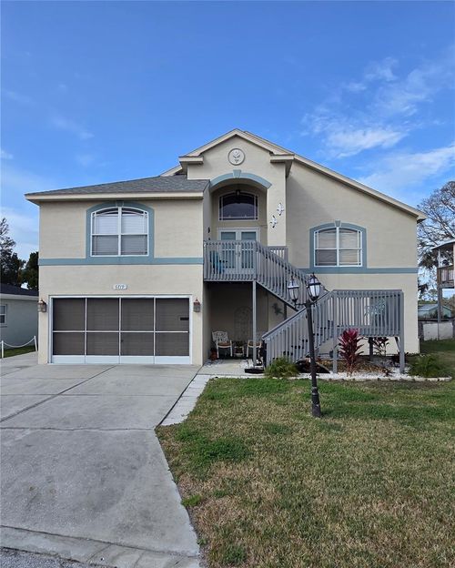 6719 Manor Beach Rd, New Port Richey, FL, 34652-1516 | Card Image