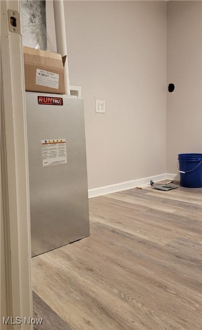 Interior details featuring hardwood / wood-style flooring | Image 11