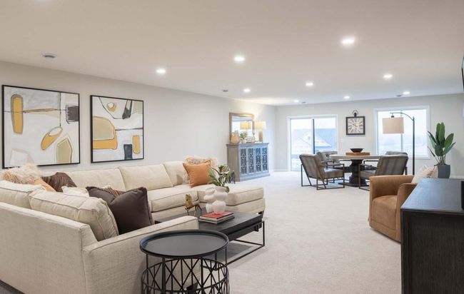 The finished lower level offers so much extra room, providing endless possibilities. The photos are from a previously built home; options and features will vary. | Image 22