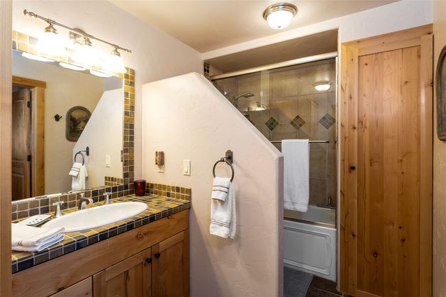 Downstairs bath with jetted, soaking tub | Image 24