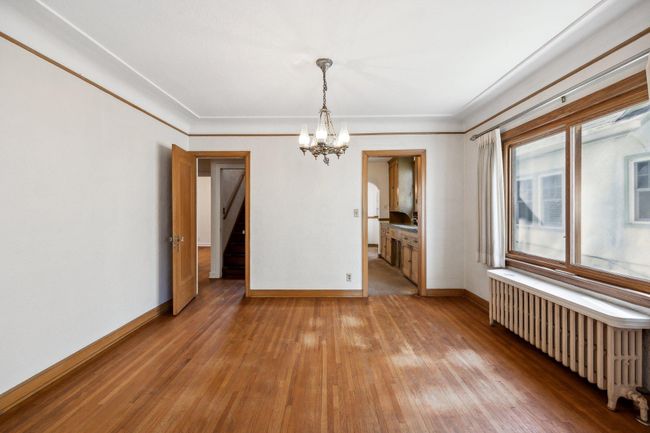 Formal dining room has a nice amount of natural light. | Image 5