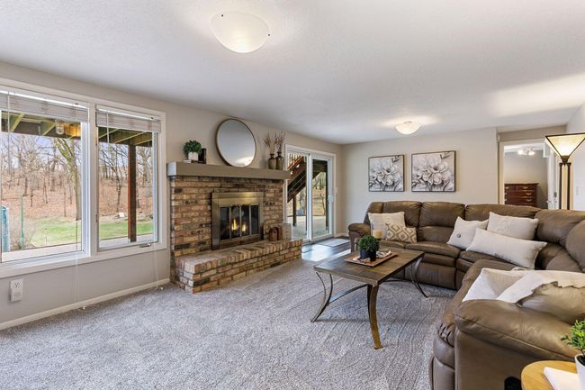 Anderson sliding glass door leads to lower level patio and backyard | Image 30
