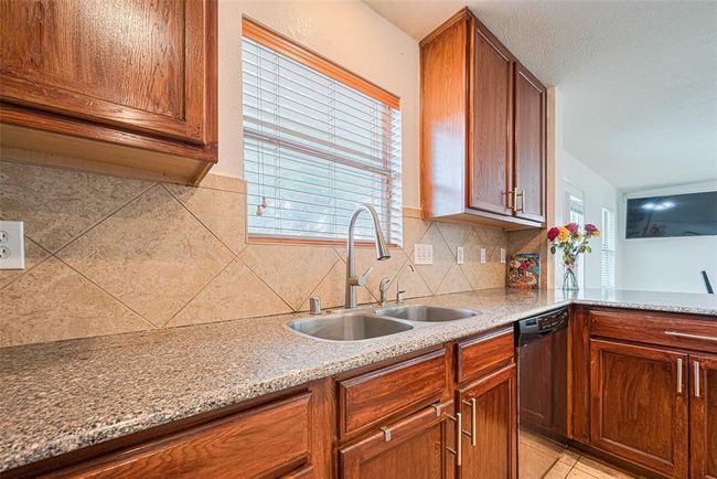 The Double sink and extra counter space | Image 17