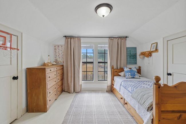 3rd Bedroom with vaulted ceiling and hardwood floors | Image 18