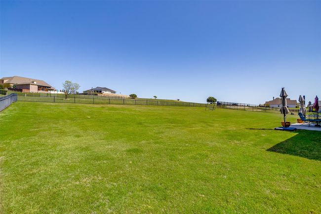 View of yard with fence | Image 34