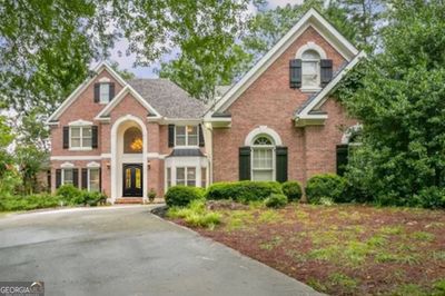 8245 Royal Troon, House other with 6 bedrooms, 5 bathrooms and 3 parking in Duluth GA | Image 1