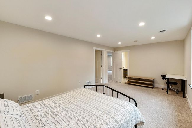 Lower level bedroom also has it's own full bathroom and walk-in closet | Image 34
