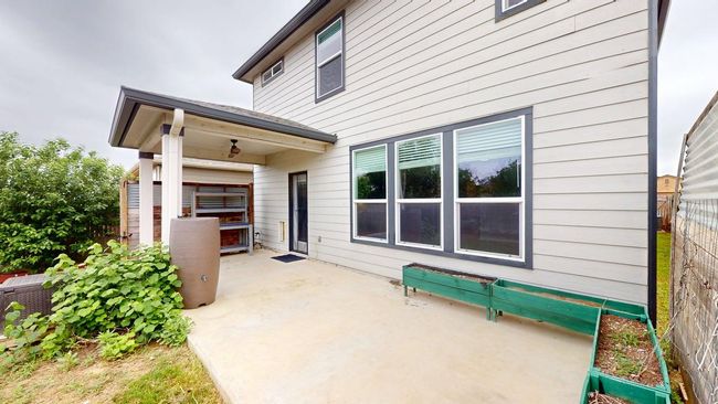 Back of house featuring fence and a patio area | Image 36