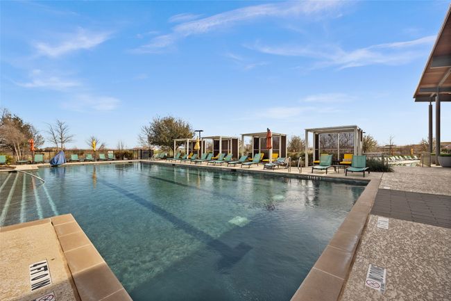 Community pool featuring a patio and fence | Image 21