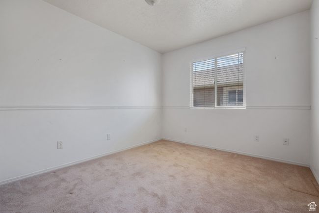 Carpeted spare room with baseboards | Image 18
