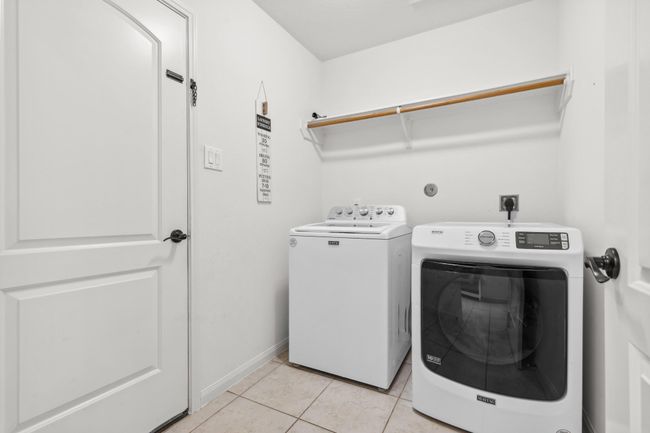 Laundry room just off the garage | Image 24