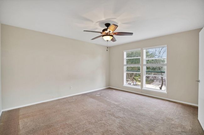 Empty room featuring carpet and ceiling fan | Image 17