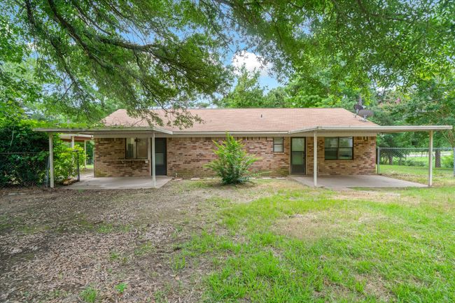 Back of house with a patio area and brick siding | Image 29