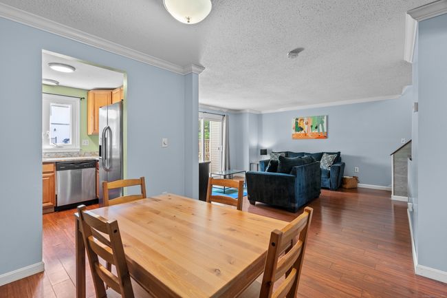 Open concept dining room/ living room. | Image 6
