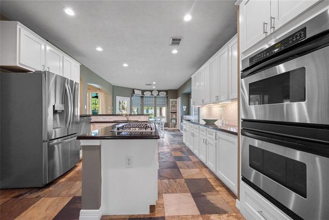 9519 Woodcliff Lake Dr, House other with 5 bedrooms, 5 bathrooms and 4 parking in Spring TX | Image 12
