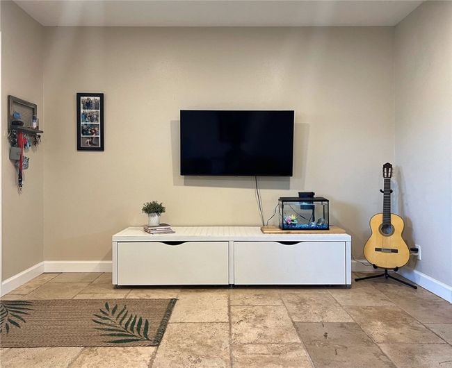 LEFT SIDE OF THE LIVING ROOM WHEN YOU WALK IN. | Image 5