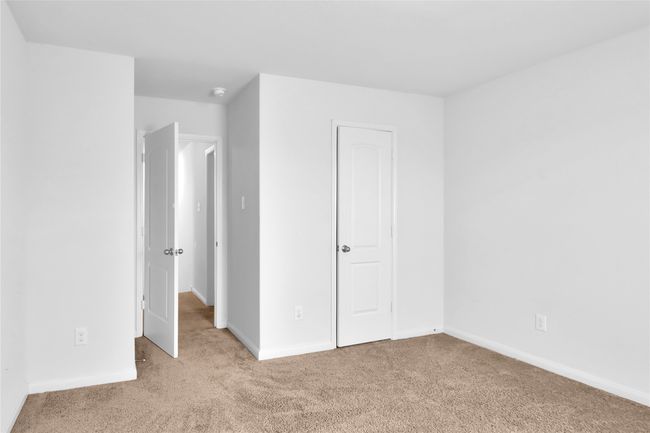 Unfurnished bedroom with carpet flooring and baseboards | Image 20