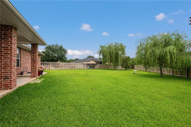 View of yard featuring a patio area | Image 25