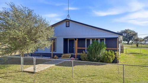 1037 County Road 7711, Devine, TX, 78016-4558 | Card Image