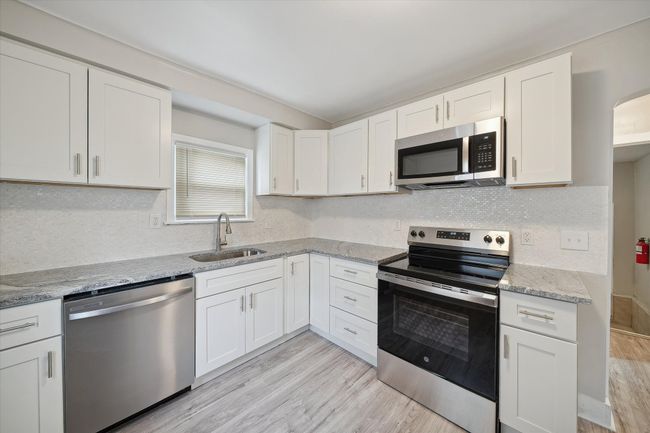 New Custom Kitchen with exotic granite | Image 6