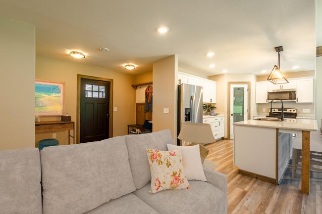 Spacious foyer with hooks for Jackets and added Ranch Style character. There is an Entry closet (unseen in the photo) | Image 5