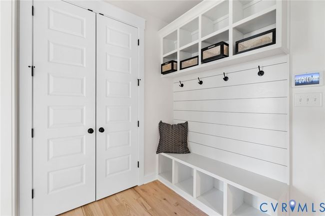 Mudroom featuring light wood-style flooring | Image 23