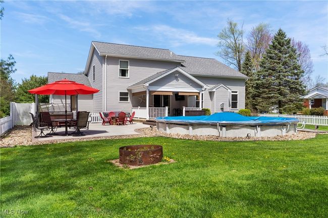 Back of property with fire-it, partial in ground pool | Image 37