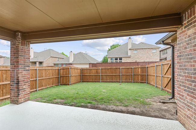 View of yard with a patio and a fenced backyard | Image 38