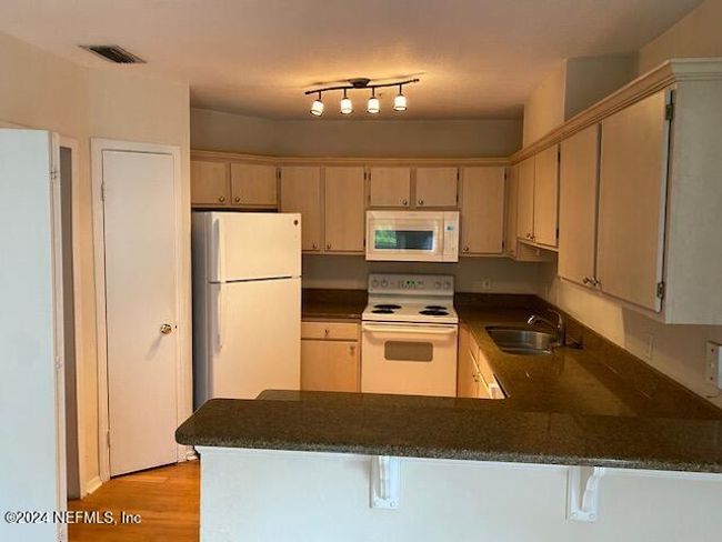 1111 - 1701 The Greens Way, Condo with 2 bedrooms, 2 bathrooms and null parking in JACKSONVILLE BEACH FL | Image 11