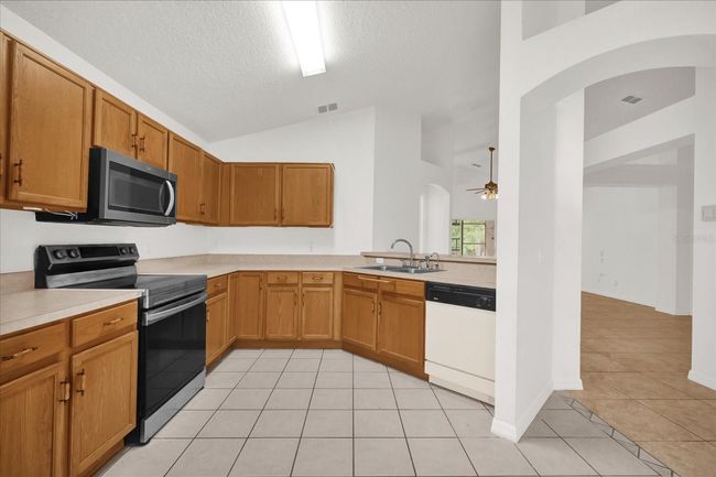 3390 Cypress Point Cir, House other with 3 bedrooms, 2 bathrooms and null parking in Saint Cloud FL | Image 10
