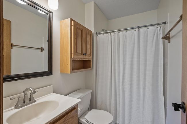 Primary private bathroom with shower and tile surround | Image 22