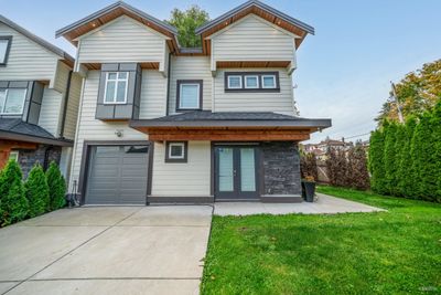 970 Rochester Ave, Home with 5 bedrooms, 2 bathrooms and 3 parking in Coquitlam BC | Image 3