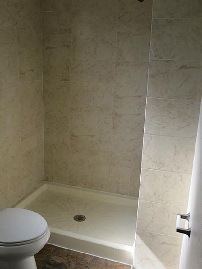 Italian commercial tile adorns the master shower. Wowzer yowzer! | Image 11