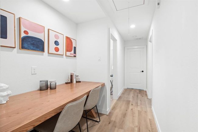 Taking advantage of every space, this is a homework/crafts space located in the bedrooms hallway | Image 18