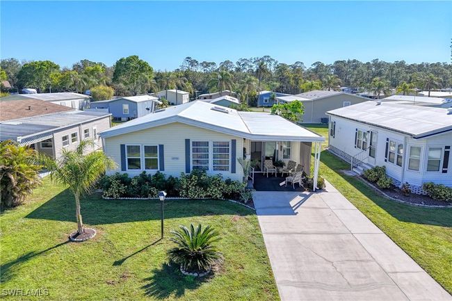 View of front facade with a front yard | Image 26