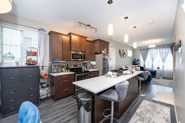 610 Redstone View Ne, Townhouse with 2 bedrooms, 3 bathrooms and 2 parking in Calgary AB | Image 14
