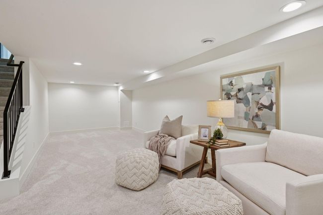 Another view of the lower level family room. | Image 19