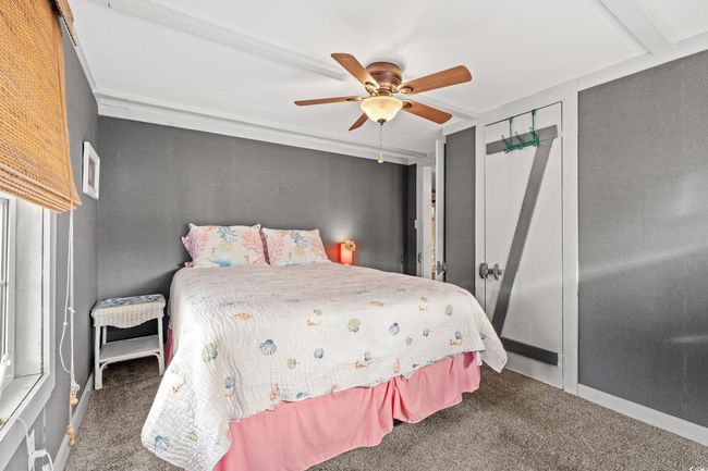 Bedroom with carpet flooring and ceiling fan | Image 20