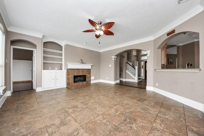 Living room with fireplace | Image 15